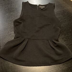 Attention peplum top size medium